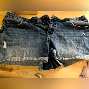 Lauren Conrad distressed denim shorts.